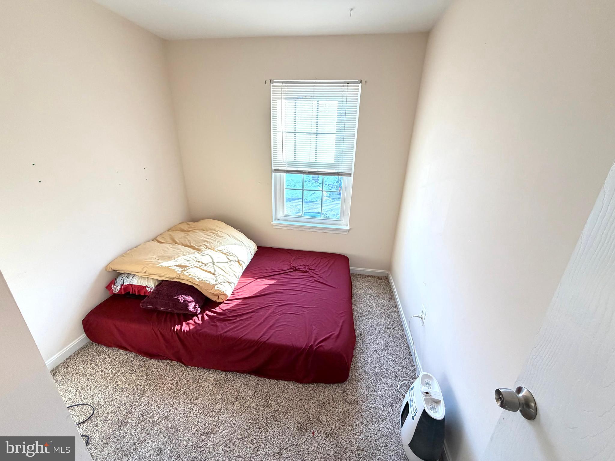 8 Hardwood Drive Rosedale, MD 21237 - Photo 15 of 42 a bedroom with a bed and a window