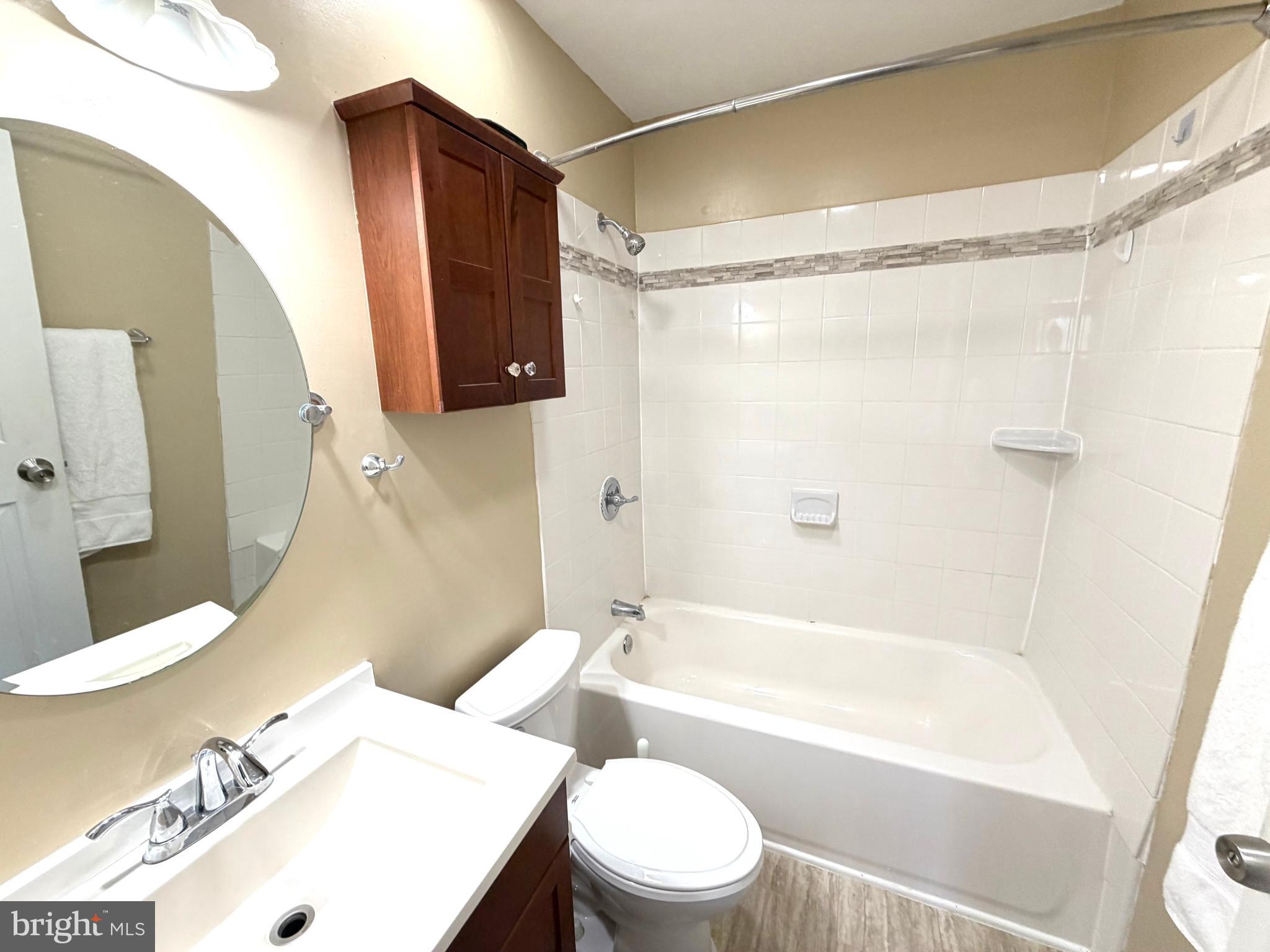 8 Hardwood Drive Rosedale, MD 21237 - Photo 16 of 42 a bathroom with a sink toilet and shower