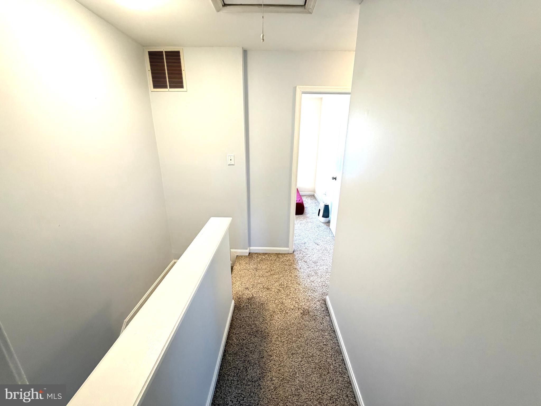 8 Hardwood Drive Rosedale, MD 21237 - Photo 21 of 42 a view of hallway with stairs