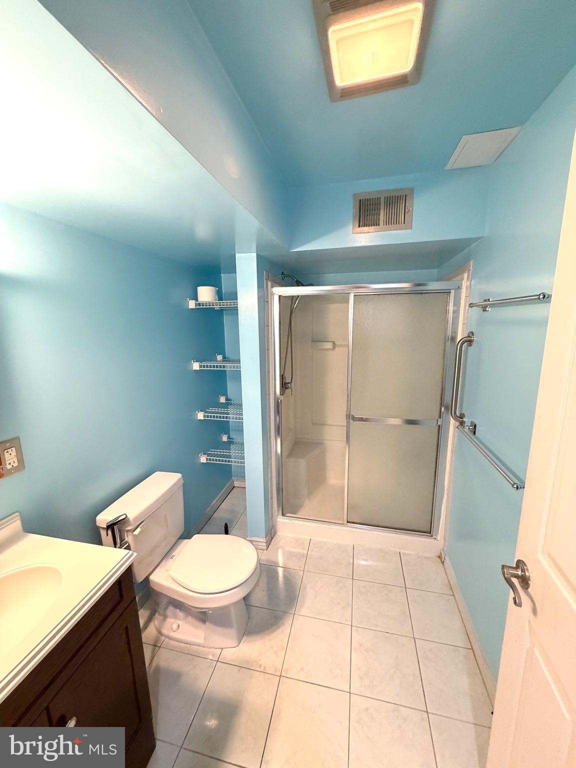 8 Hardwood Drive Rosedale, MD 21237 - Photo 26 of 42 a bathroom with a toilet and a shower