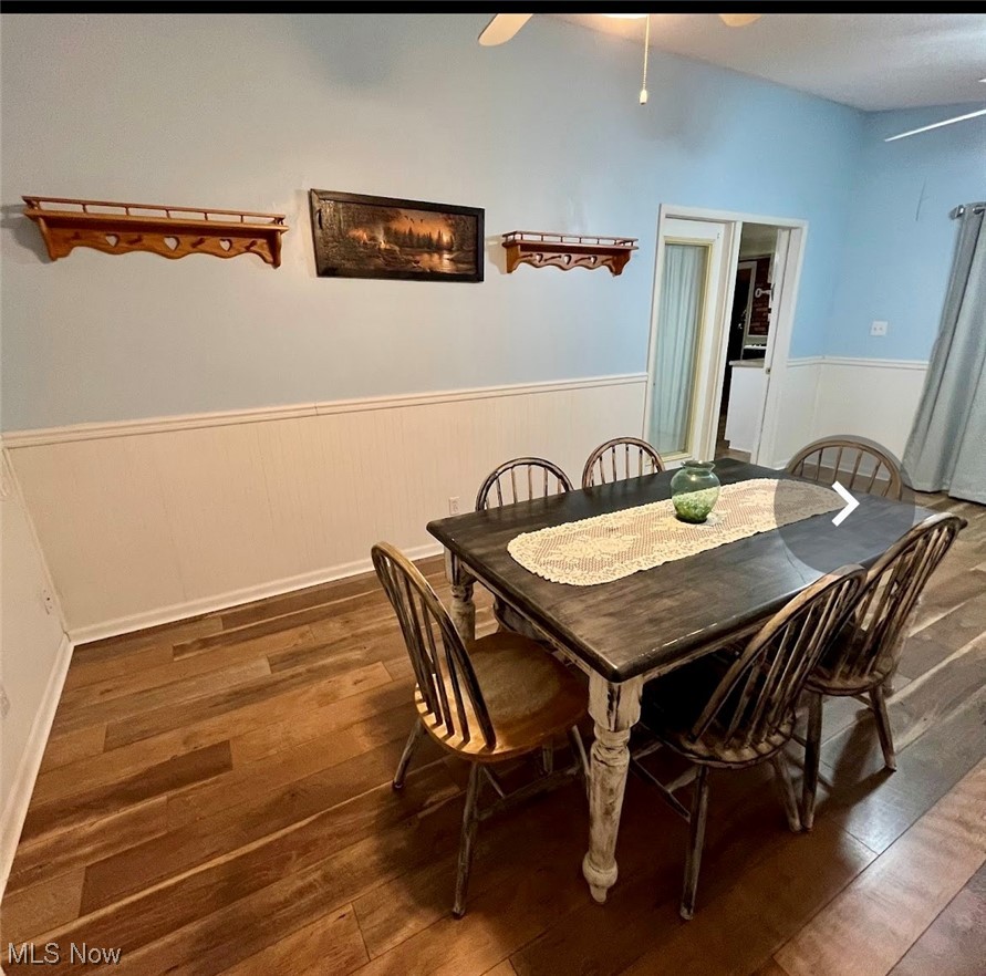4091 Lynn Road Ravenna, OH 44266 - Photo 13 of 23 Dining room featuring dark wood-type flooring and ceiling fan