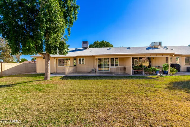 a front view of a house with swimming pool
