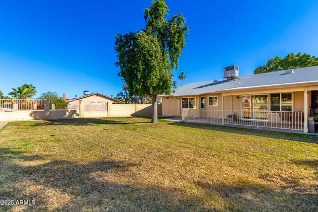 a view of a house with a swimming pool
