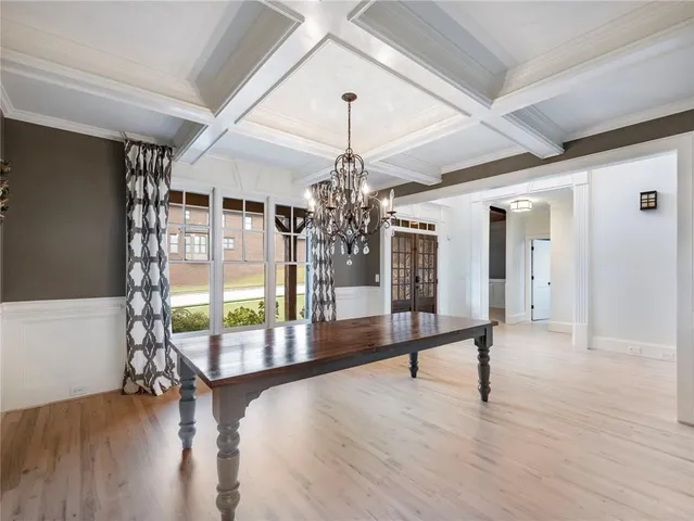 a living room with furniture fireplace and a window