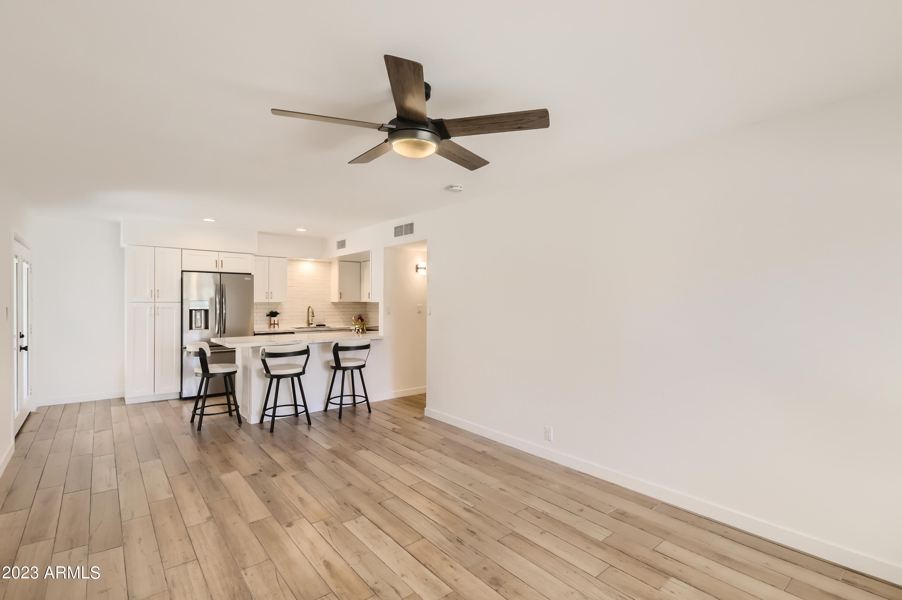 1320 East Bethany Home Road, Unit 42 Phoenix, AZ 85014 - Photo 2 of 13 03 Living Room to Kitchen