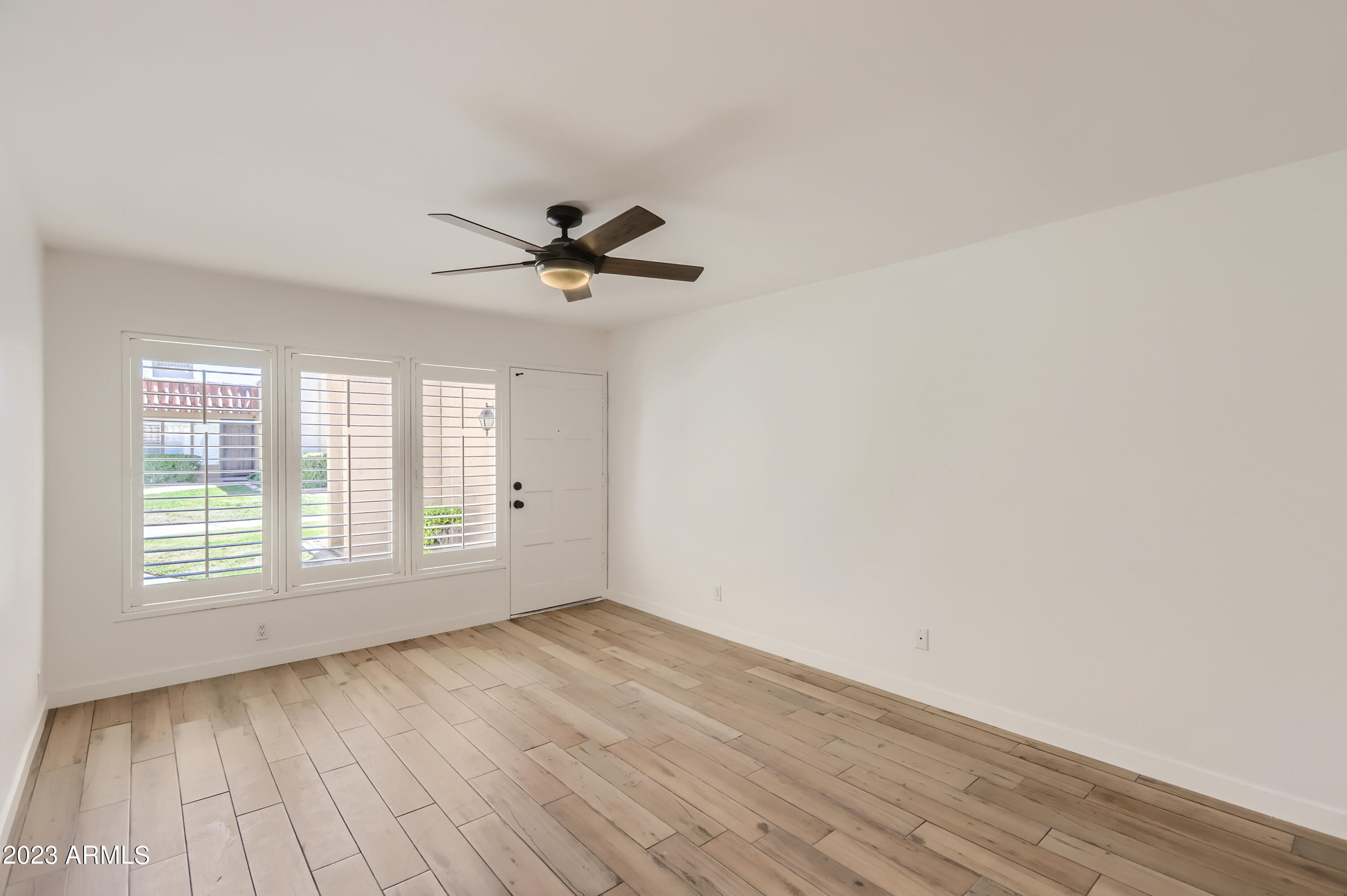 1320 East Bethany Home Road, Unit 42 Phoenix, AZ 85014 - Photo 6 of 13 02 Living Room