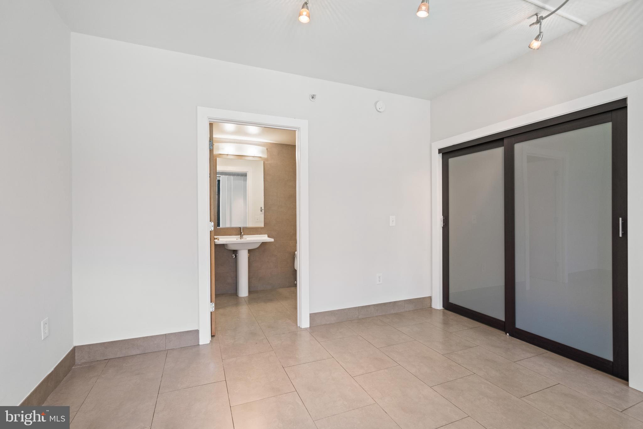 1133 14th Street Northwest, Unit 208 Washington, DC 20005 - Photo 12 of 27 Primary bedroom