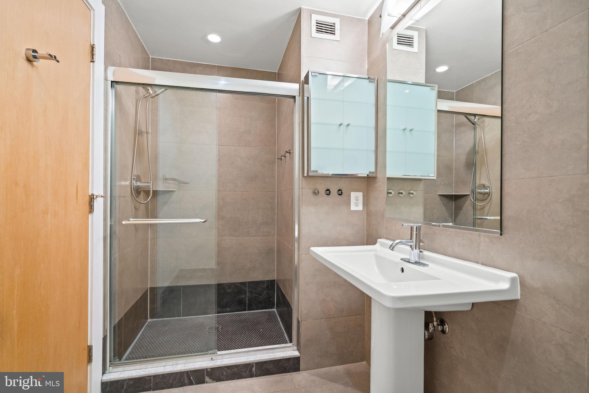 1133 14th Street Northwest, Unit 208 Washington, DC 20005 - Photo 13 of 27 1st floor bathroom