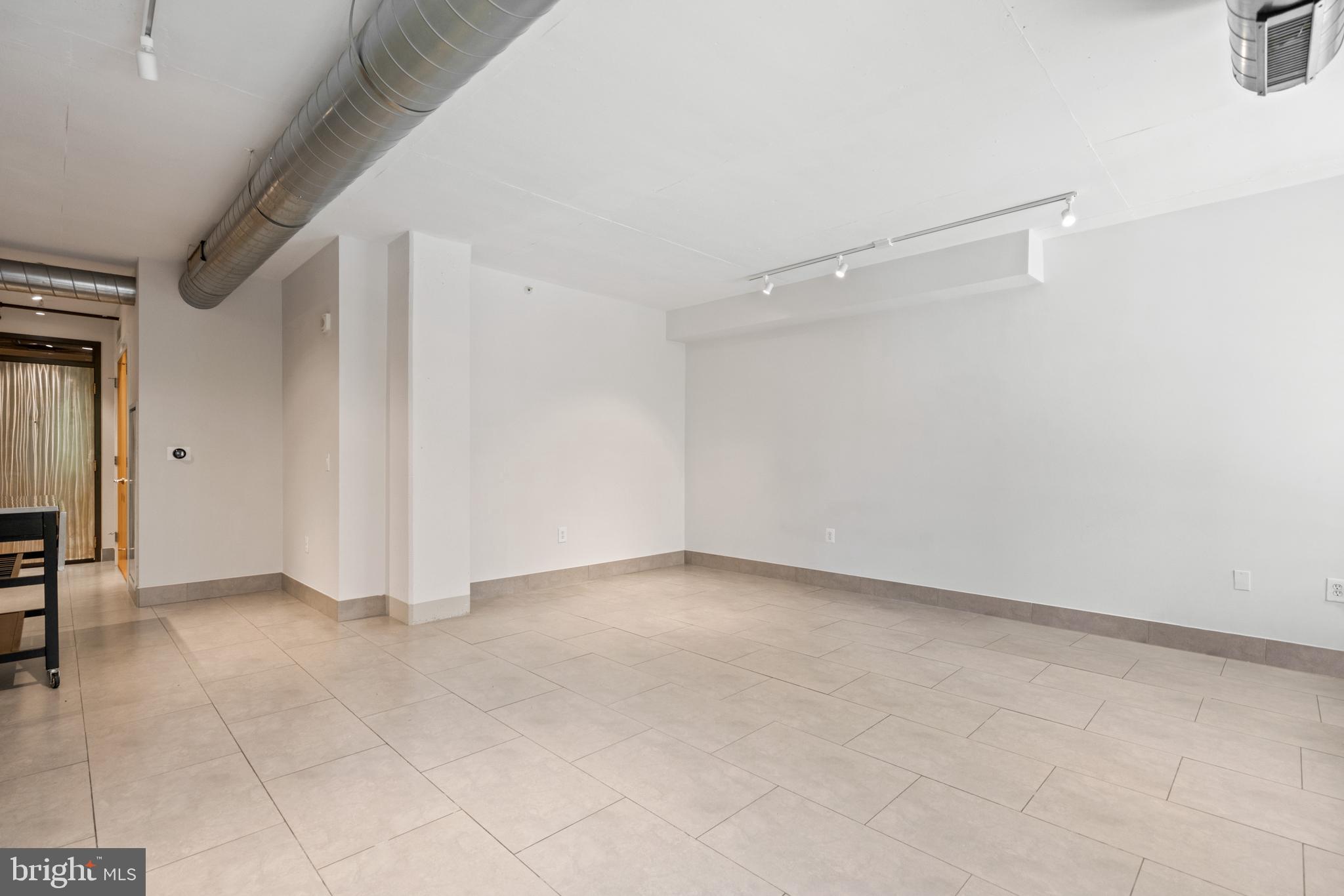 1133 14th Street Northwest, Unit 208 Washington, DC 20005 - Photo 7 of 27 Large open living / dining area