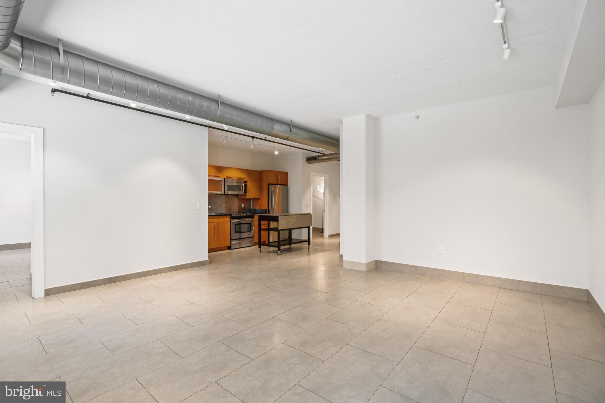 1133 14th Street Northwest, Unit 208 Washington, DC 20005 - Photo 8 of 27 Large open living / dining area