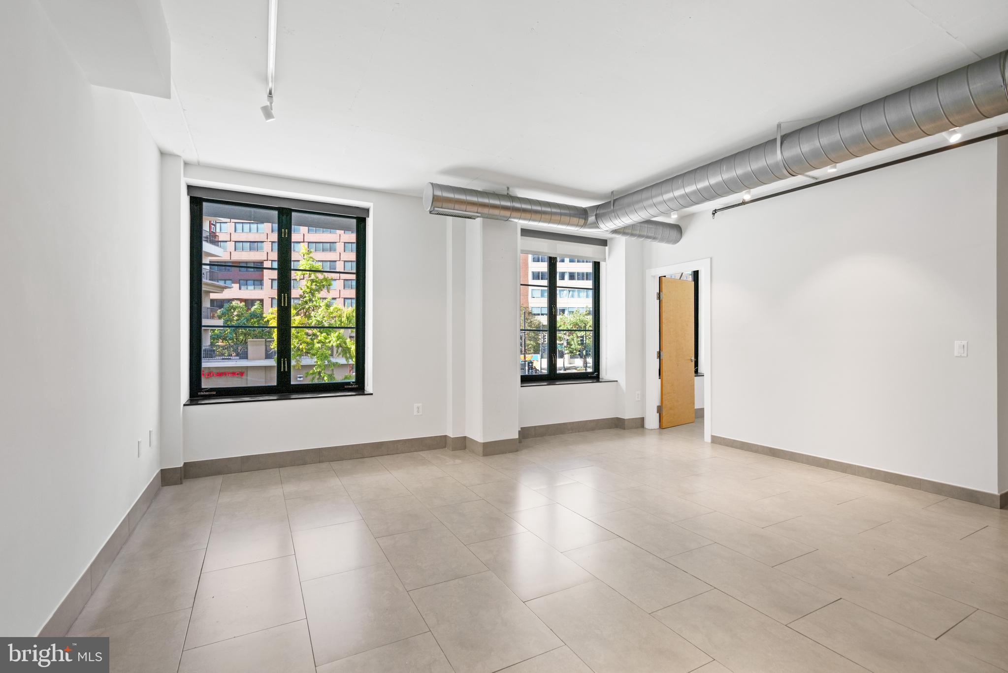 1133 14th Street Northwest, Unit 208 Washington, DC 20005 - Photo 9 of 27 Large open living / dining area