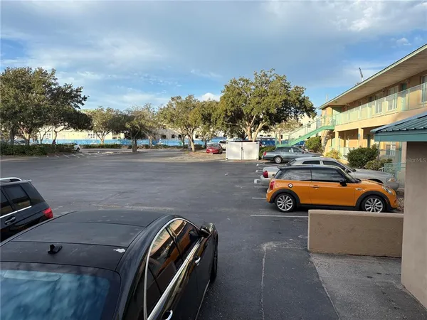 a view of a street with cars