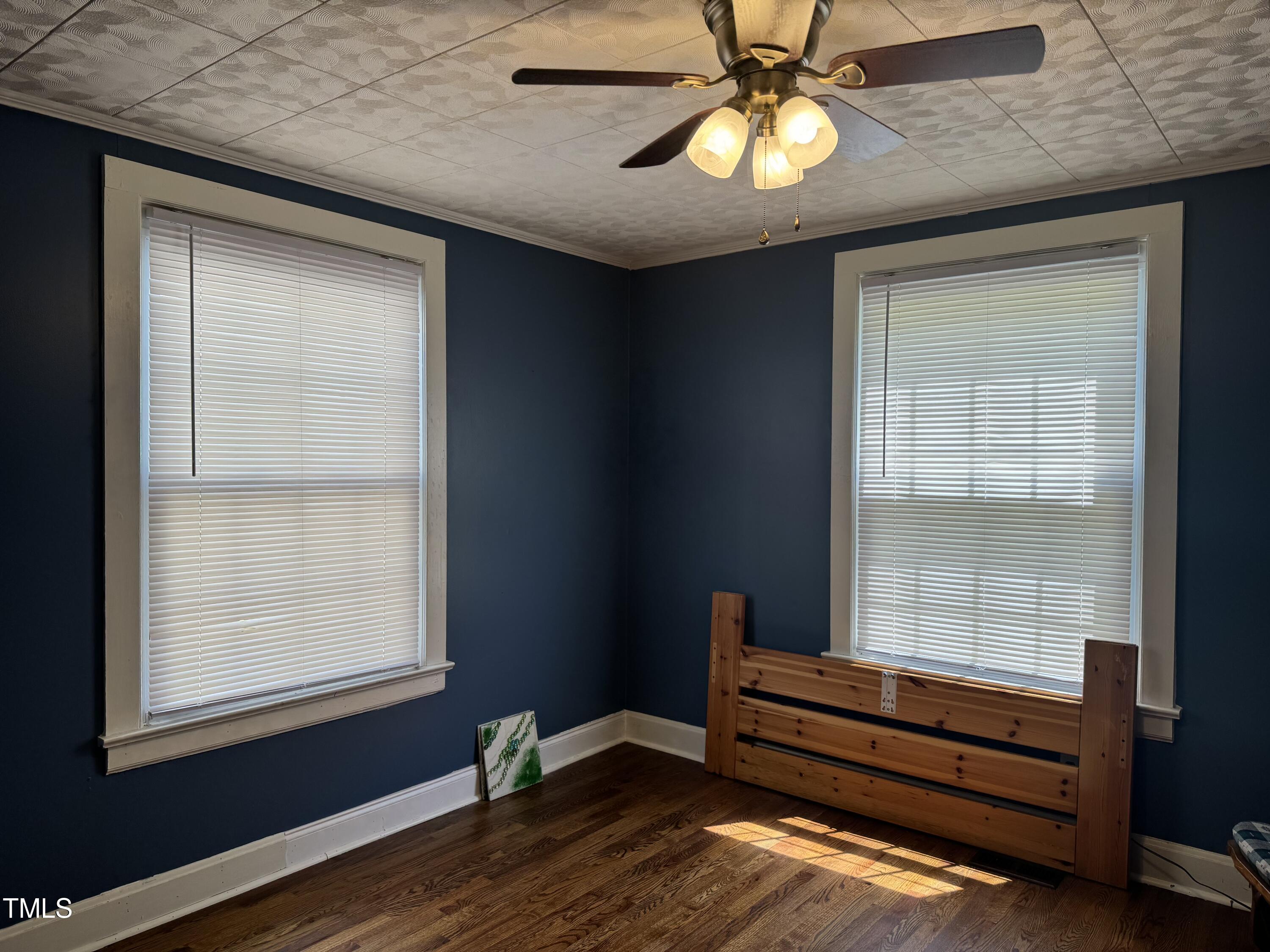 1225 Junction Road Durham, NC 27704 - Photo 3 of 10 a view of room with window and ceiling fan