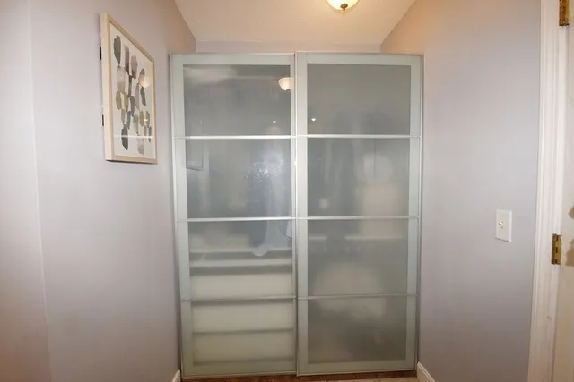 a view of an empty walk in closet