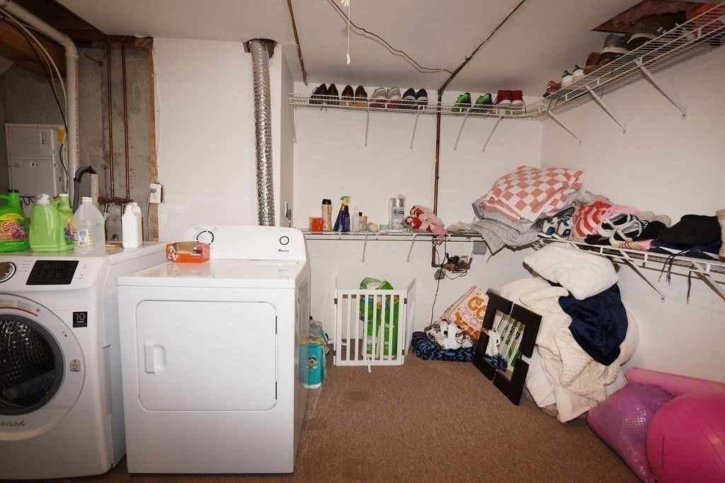 1559 Bay Street, Unit 53 Taunton, MA 02780 - Photo 32 of 40 a utility room with dryer and washer