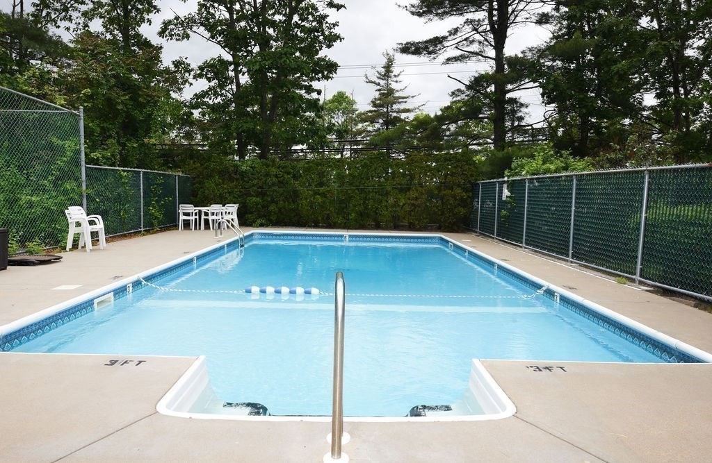 1559 Bay Street, Unit 53 Taunton, MA 02780 - Photo 38 of 40 a view of a swimming pool with a patio