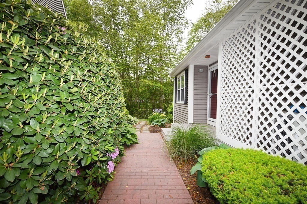 1559 Bay Street, Unit 53 Taunton, MA 02780 - Photo 5 of 40 a entryway with a garden