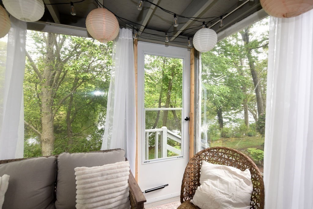 1559 Bay Street, Unit 53 Taunton, MA 02780 - Photo 6 of 40 a bedroom with furniture and a large window