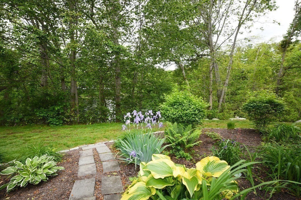 1559 Bay Street, Unit 53 Taunton, MA 02780 - Photo 7 of 40 a view of a garden with a flower garden