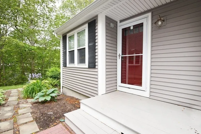 a view of a house with a white door