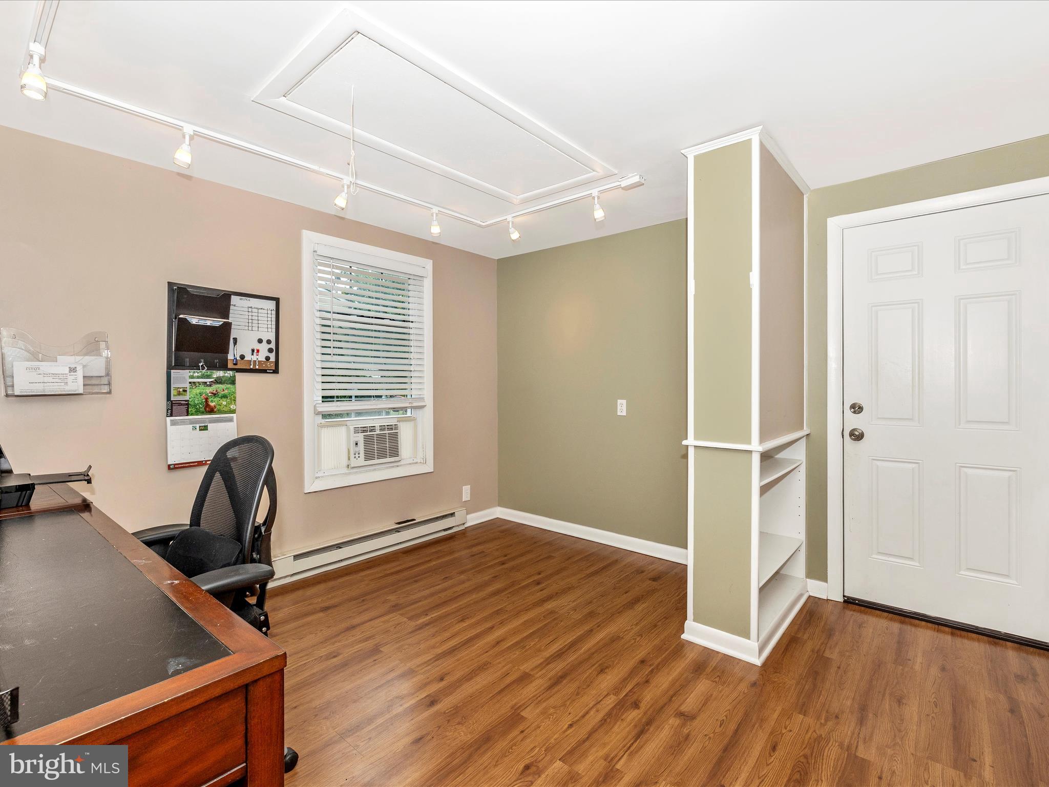 4310 Zircon Road Middletown, MD 21769 - Photo 24 of 86 a view of a room with gym equipment and wooden floor