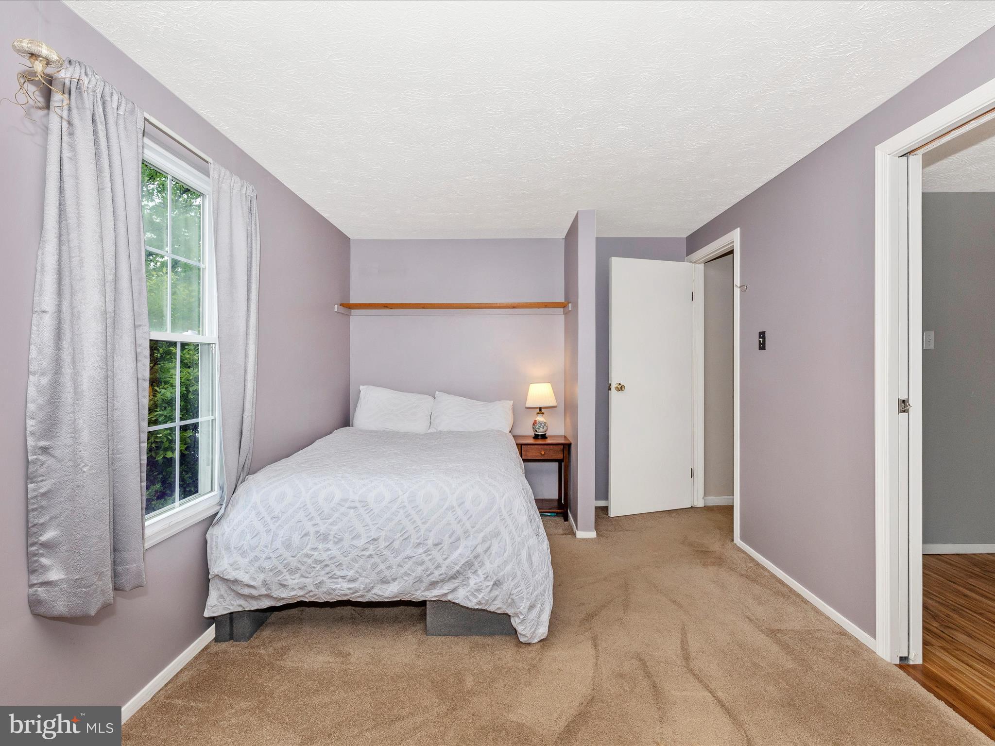 4310 Zircon Road Middletown, MD 21769 - Photo 32 of 86 a bedroom with a bed and a window