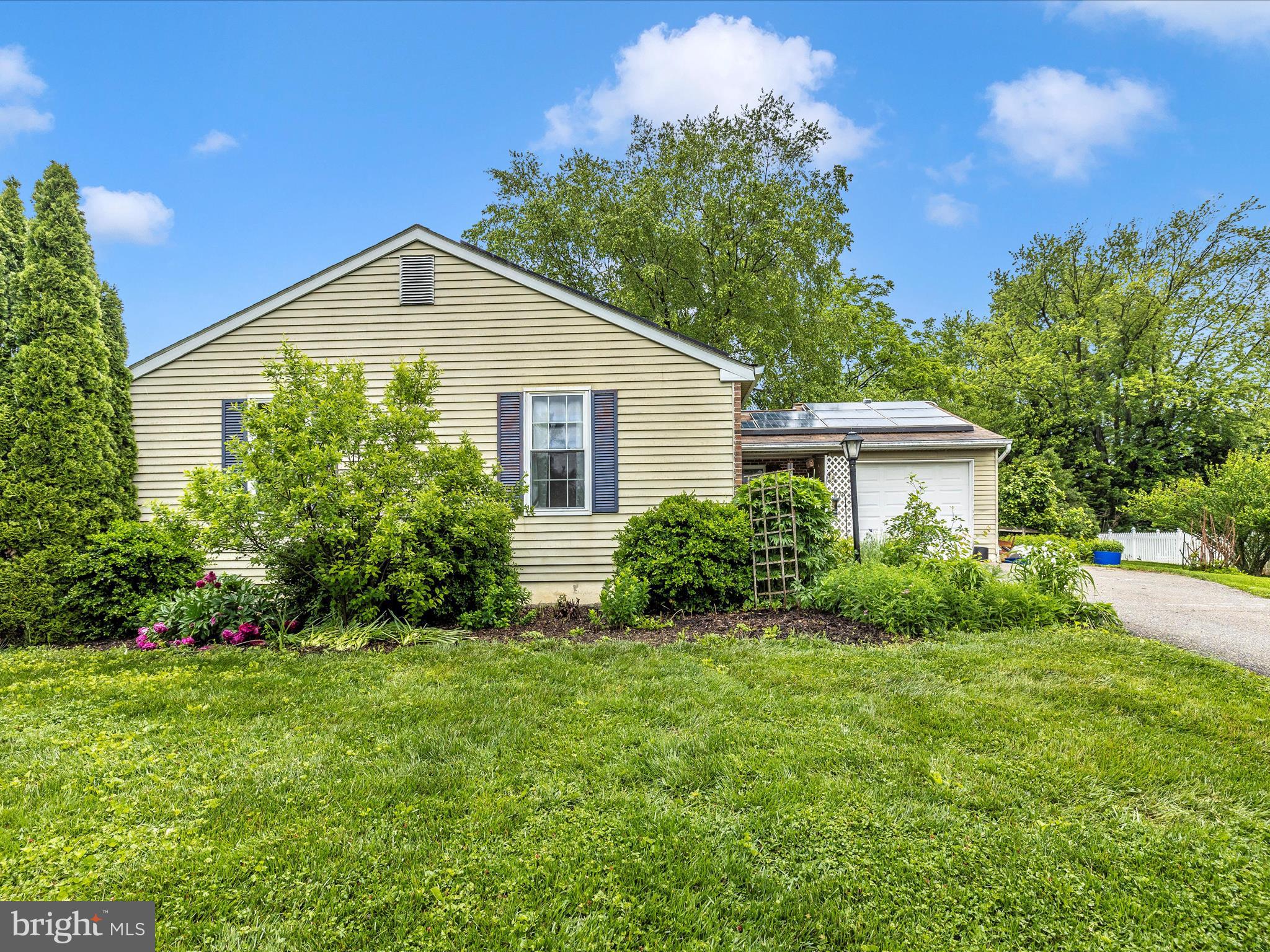 4310 Zircon Road Middletown, MD 21769 - Photo 46 of 86 a view of a house with garden and yard