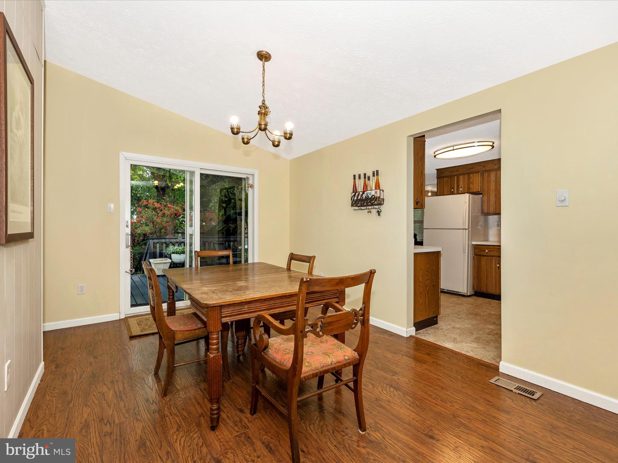 4310 Zircon Road Middletown, MD 21769 - Photo 8 of 86 a view of a dining room with furniture window and wooden floor