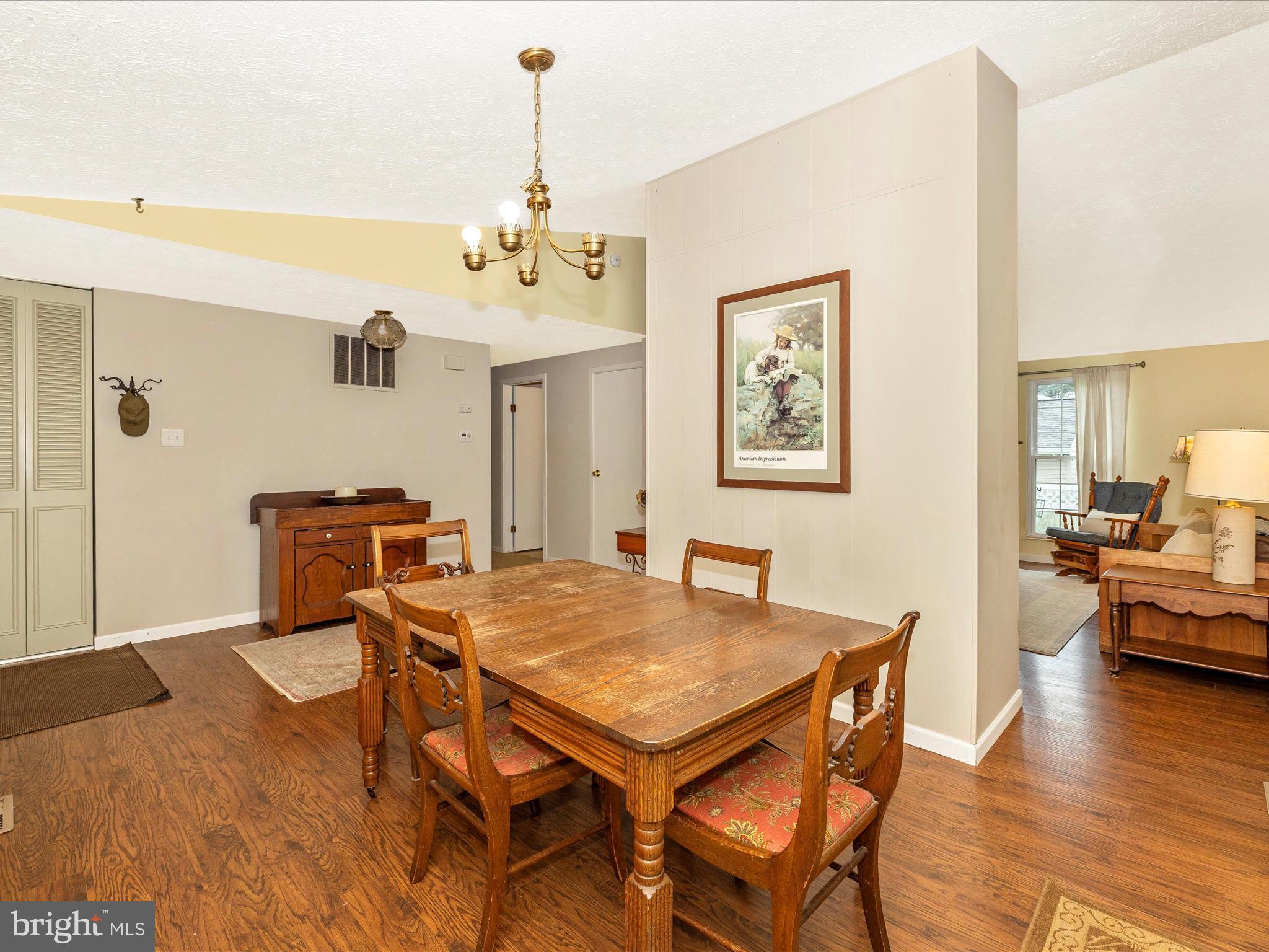 4310 Zircon Road Middletown, MD 21769 - Photo 10 of 86 a view of a dining room with furniture and wooden floor