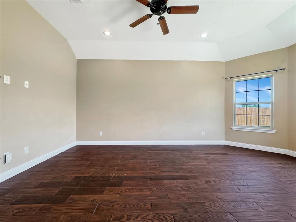 151 Crump Circle Red Oak, TX 75154 - Photo 16 of 21 Spare room with wood tiled floors, recessed lighting, lofted ceiling, and a ceiling fan