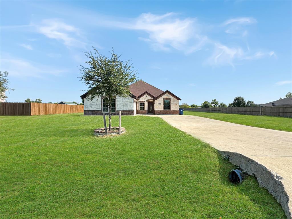151 Crump Circle Red Oak, TX 75154 - Photo 2 of 21 French country inspired facade featuring stone siding and driveway