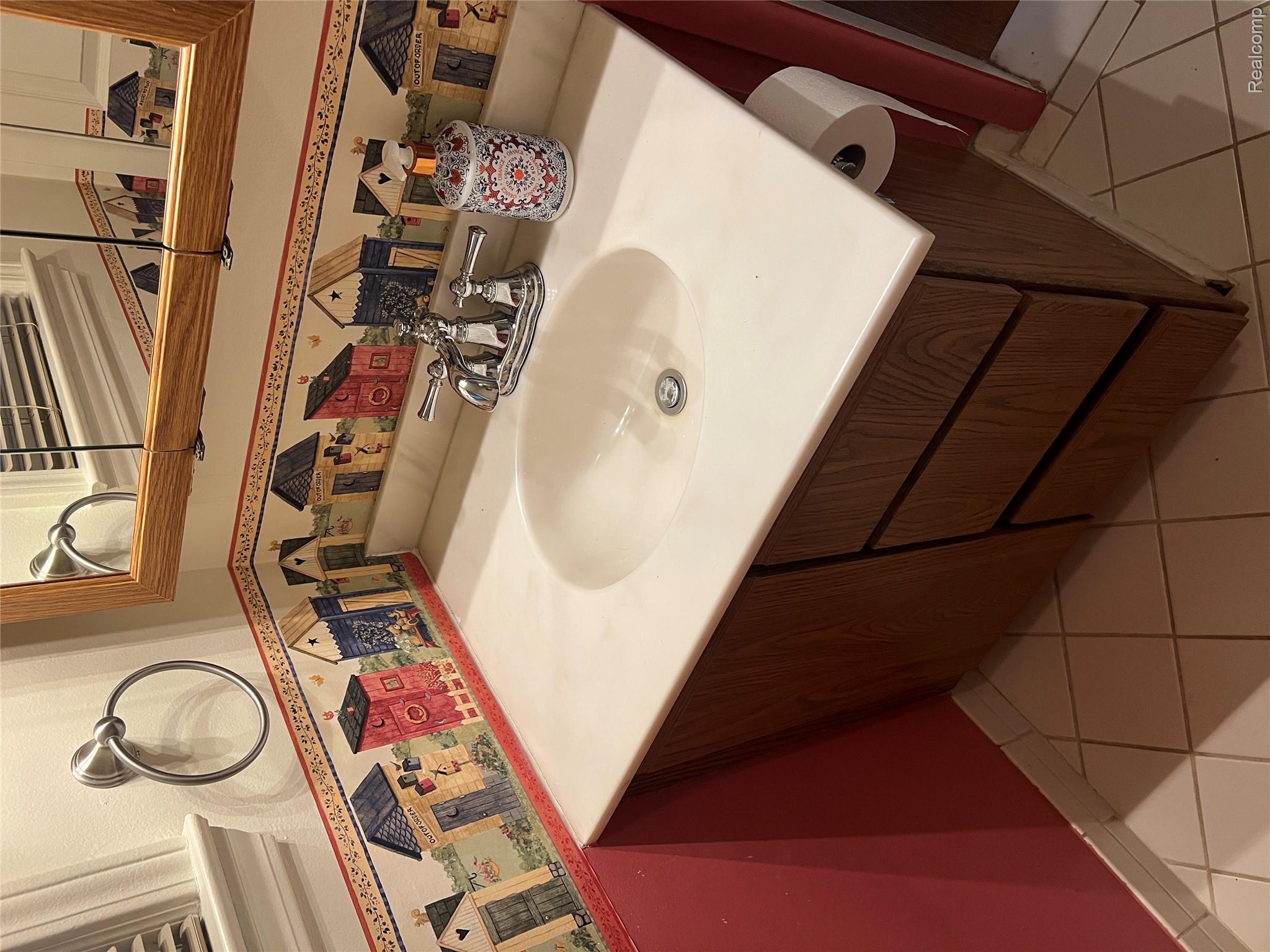 36795 Greenbush Road Wayne, MI 48184 - Photo 25 of 61 Bathroom featuring vanity and light tile patterned floors