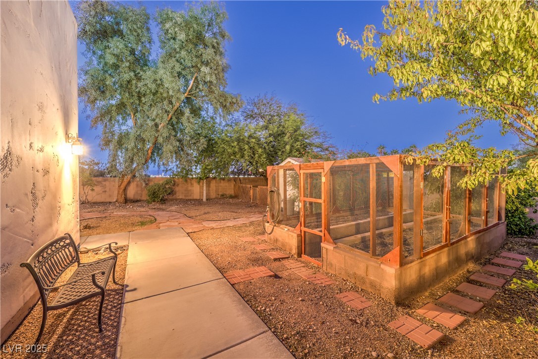 3910 West Pebble Road Las Vegas, NV 89139 - Photo 46 of 59 Fenced backyard with fruit trees and garden