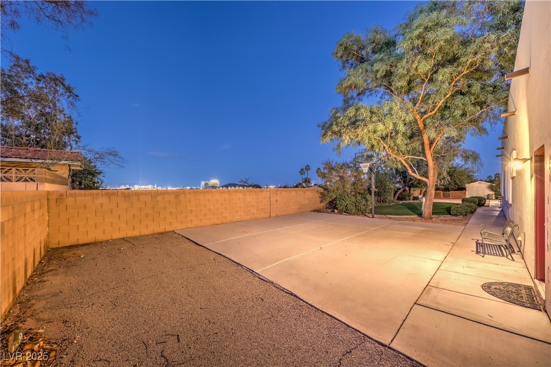 3910 West Pebble Road Las Vegas, NV 89139 - Photo 48 of 59 Fenced backyard with a patio area