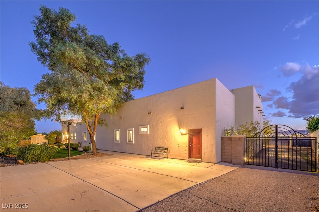 3910 West Pebble Road Las Vegas, NV 89139 - Photo 49 of 59 Rear view of house with gate