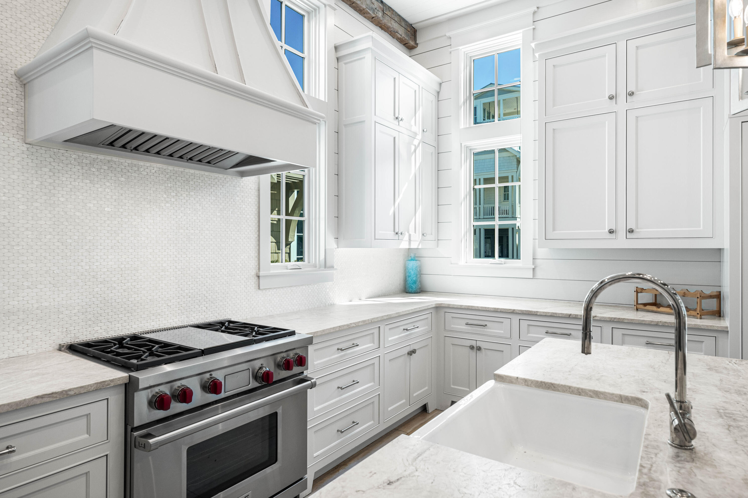 10 Rainer Ln Inlet Beach Inlet Beach, FL 32461 - Photo 15 of 55 a kitchen with stainless steel appliances a sink stove and cabinets