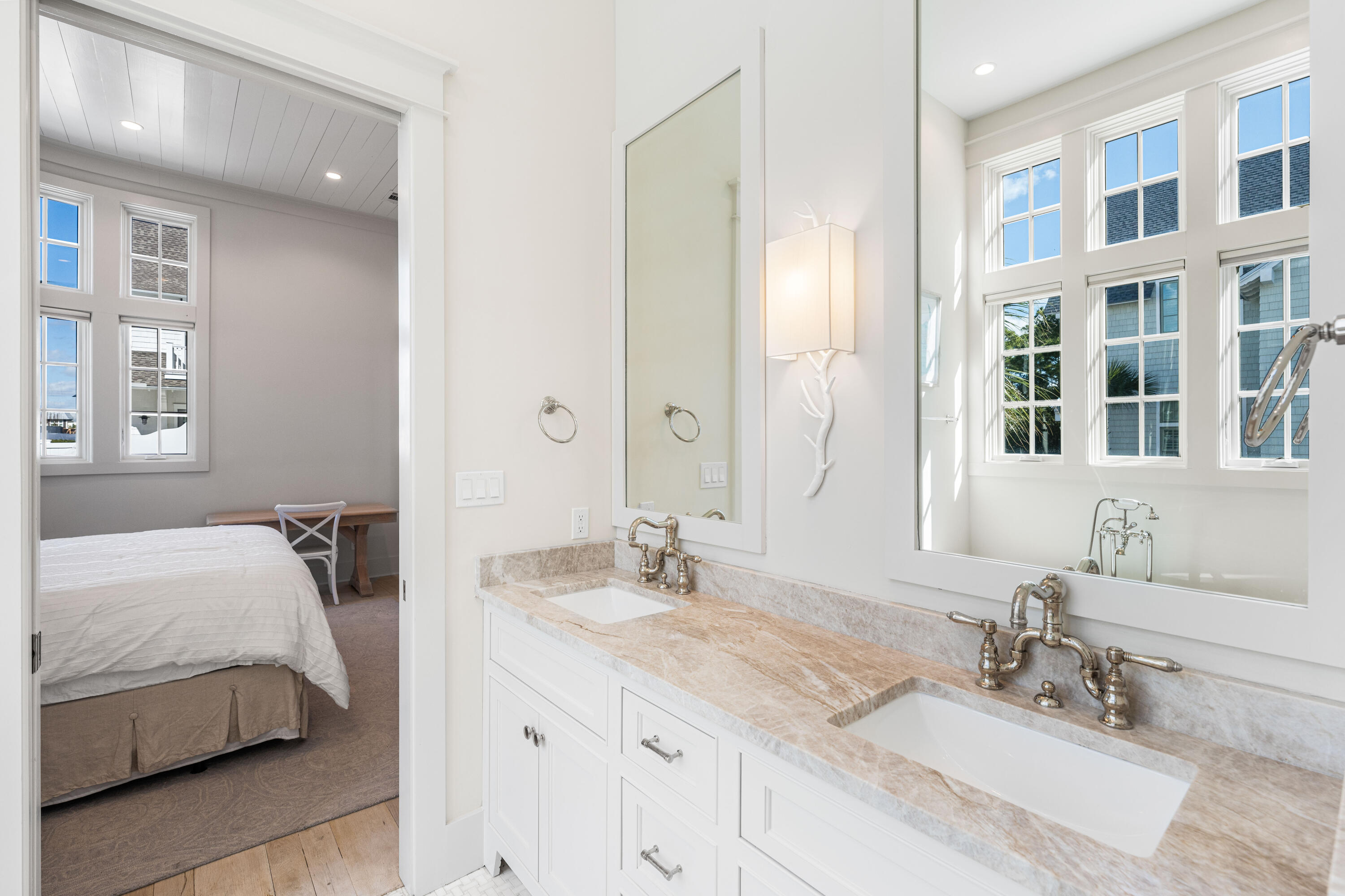 10 Rainer Ln Inlet Beach Inlet Beach, FL 32461 - Photo 22 of 55 a en suite bathroom with a double vanity sink and a mirror
