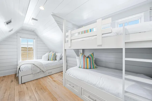 a view of a roof deck with couches and city view