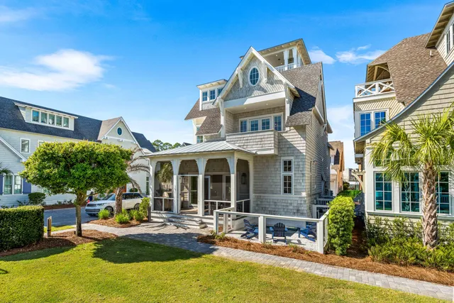 a view of a chairs and table in a patio