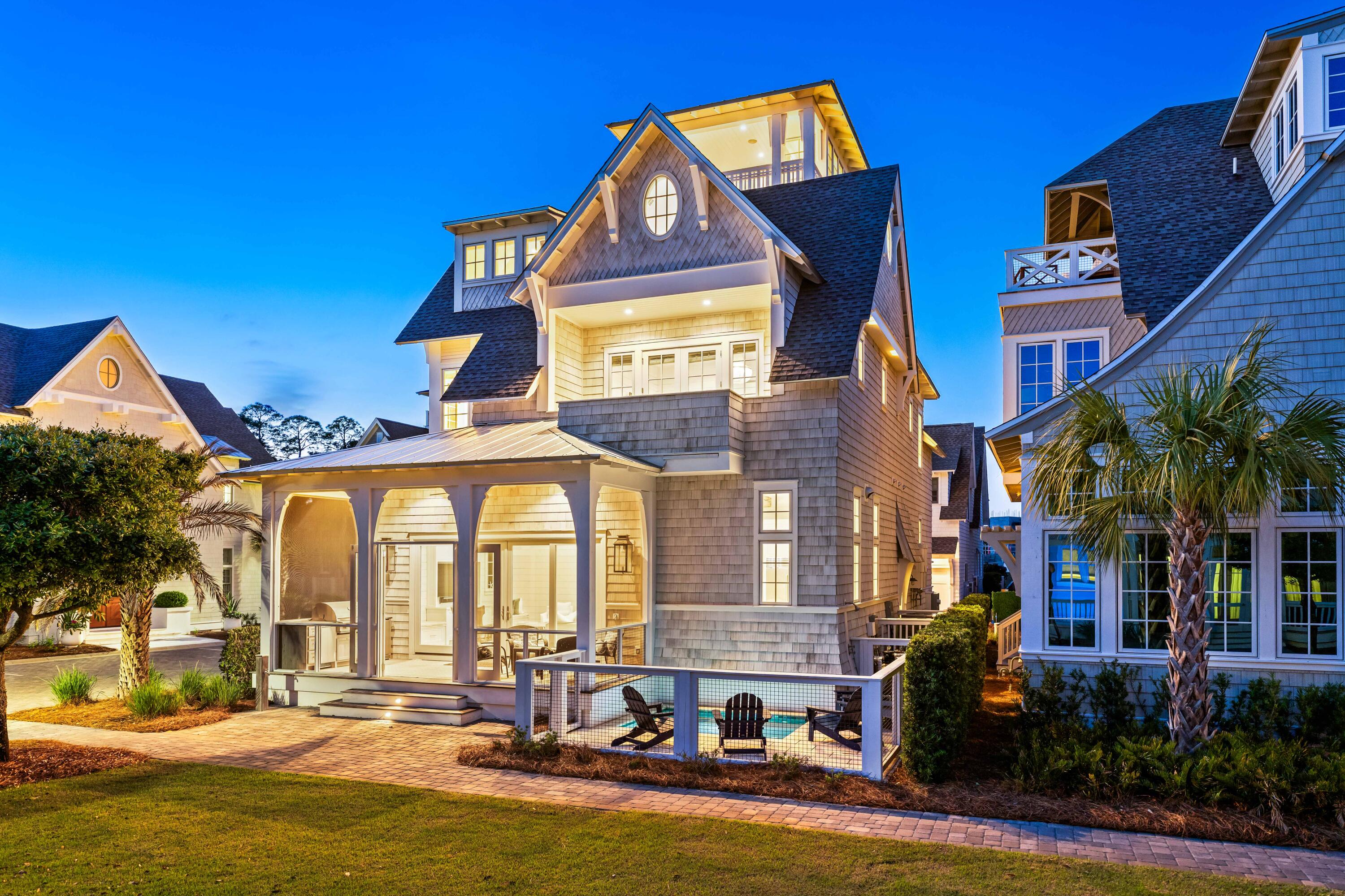 10 Rainer Ln Inlet Beach Inlet Beach, FL 32461 - Photo 51 of 55 a front view of a building with a garden and plants