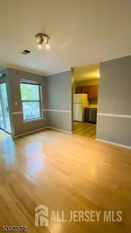 a view of an empty room with window