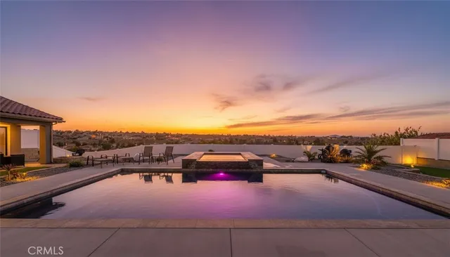 a view of city street with a car parked on the road