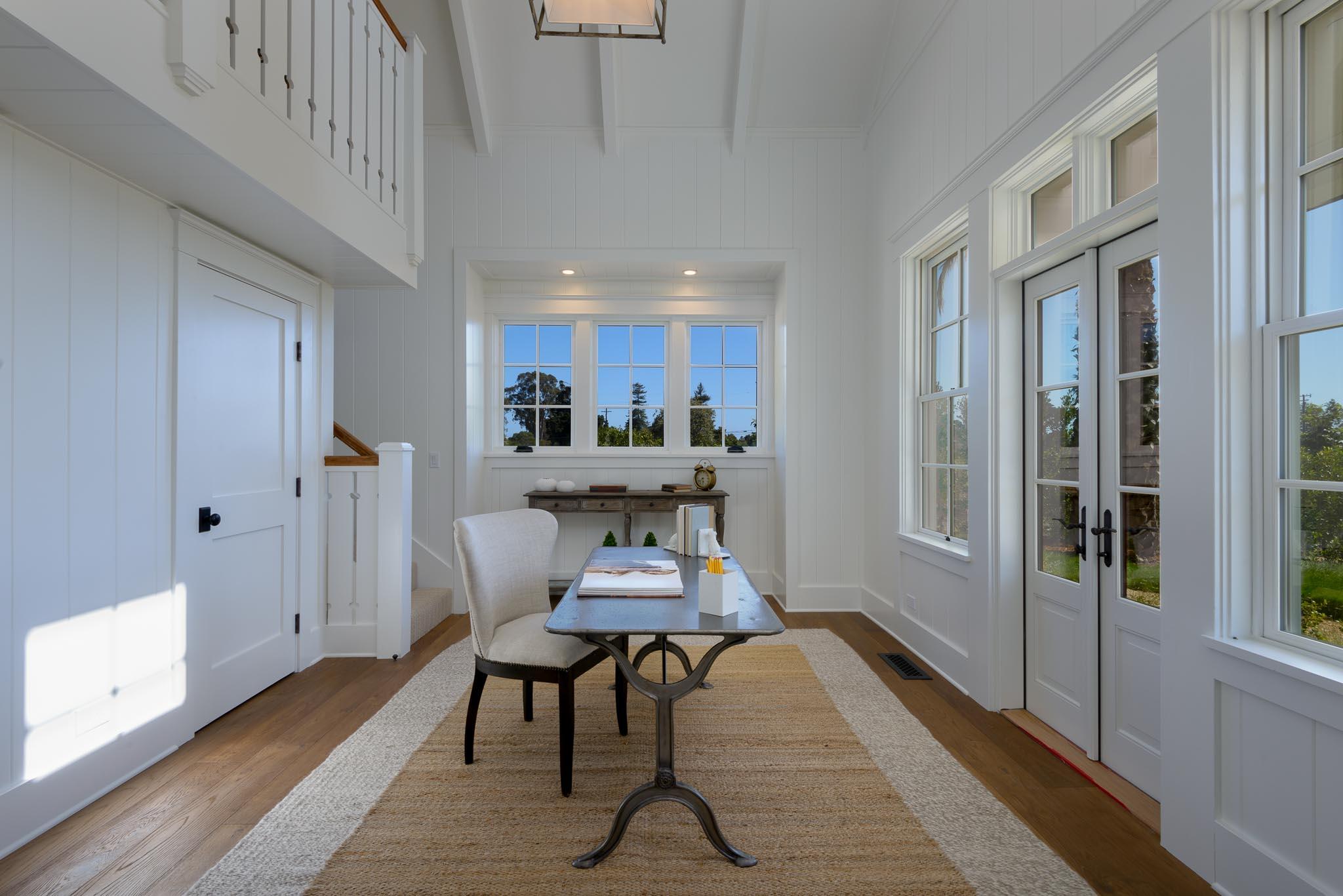 130 Tiburon Bay Lane Montecito, CA 93108 - Photo 17 of 31 a view of a dining room with furniture and wooden floor