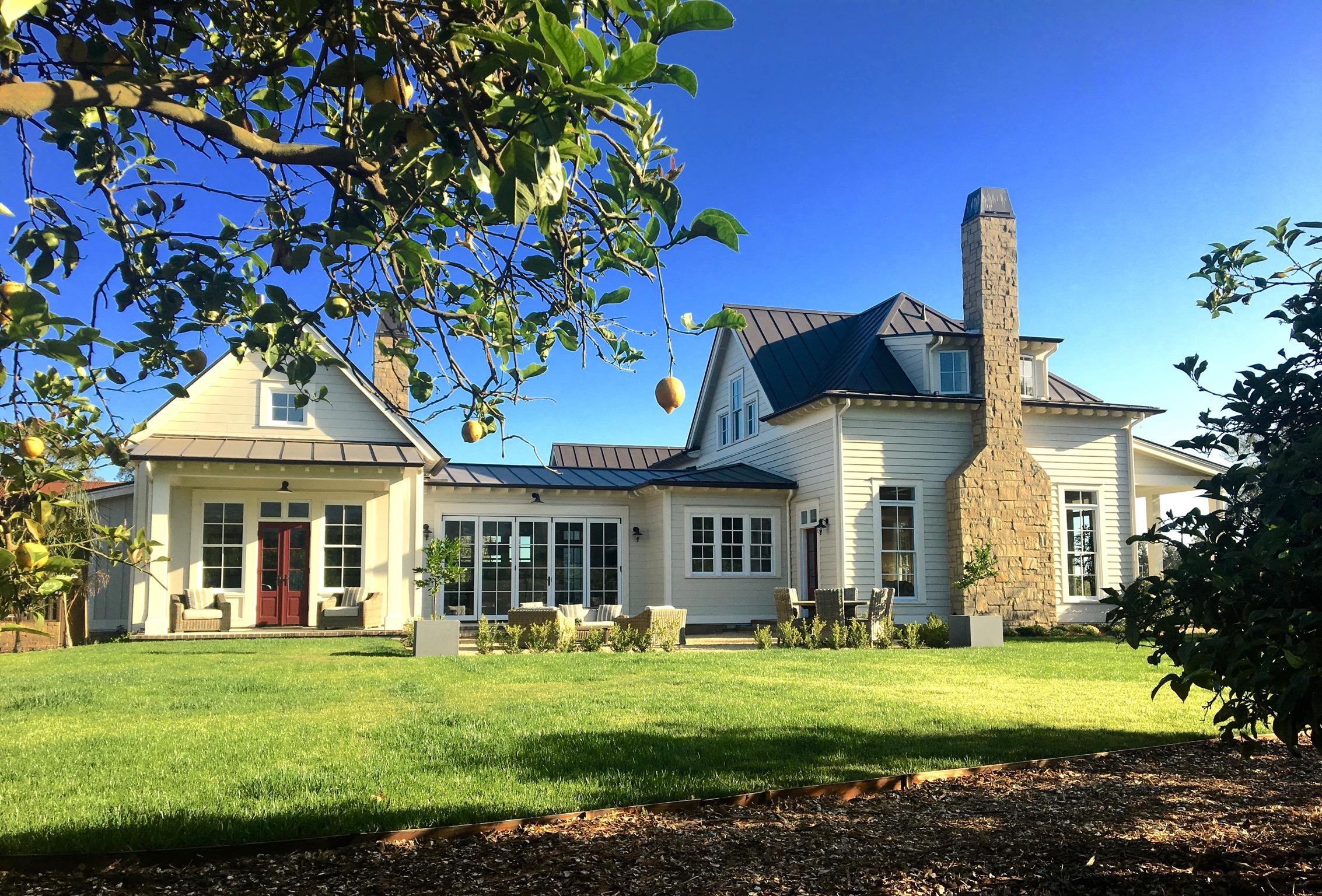 130 Tiburon Bay Lane Montecito, CA 93108 - Photo 2 of 31 a front view of a house with a garden