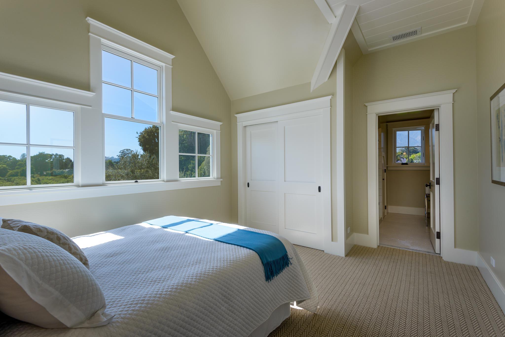 130 Tiburon Bay Lane Montecito, CA 93108 - Photo 23 of 31 a bedroom with a bed and a window