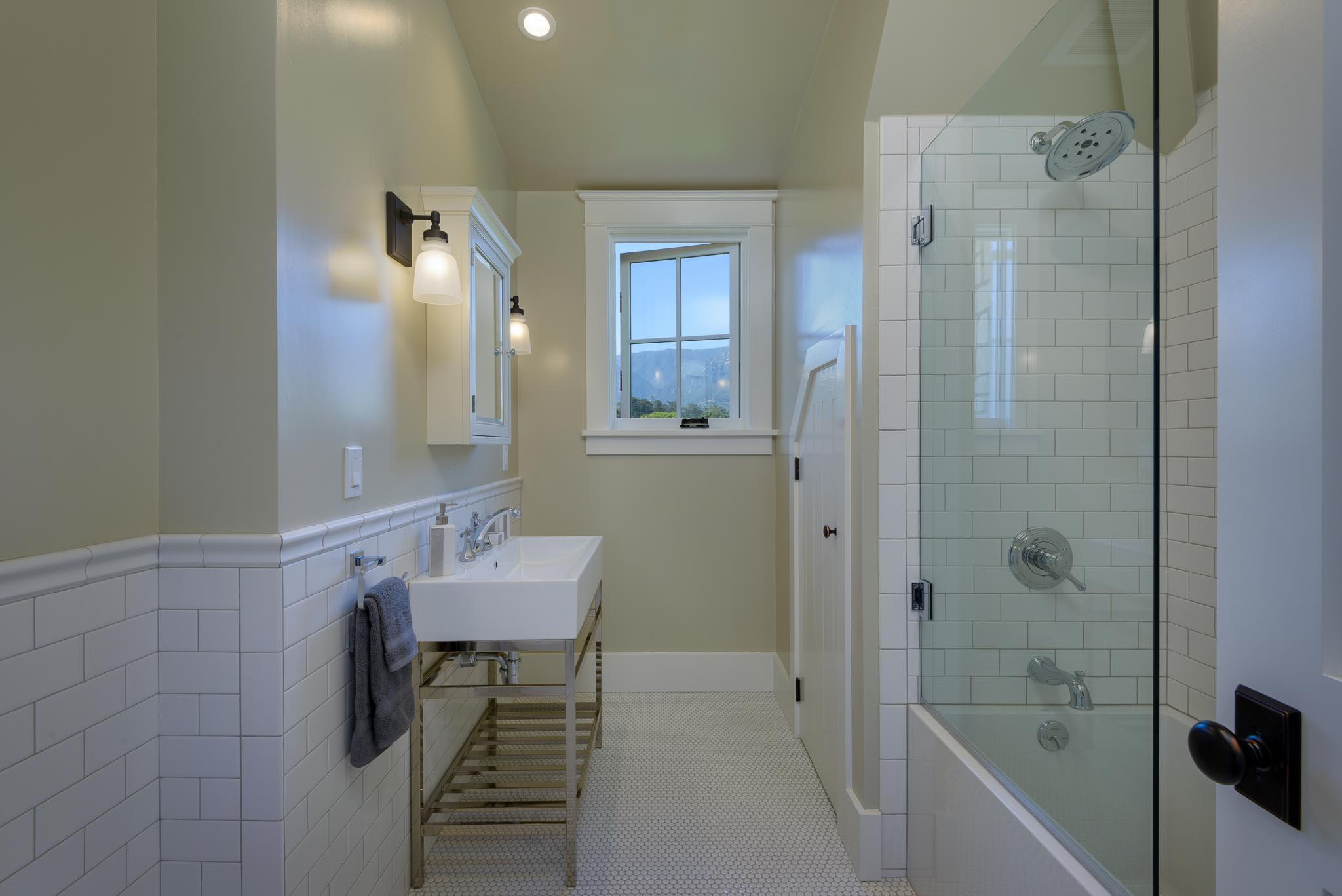 130 Tiburon Bay Lane Montecito, CA 93108 - Photo 24 of 31 a bathroom with a bathtub shower sink and mirror