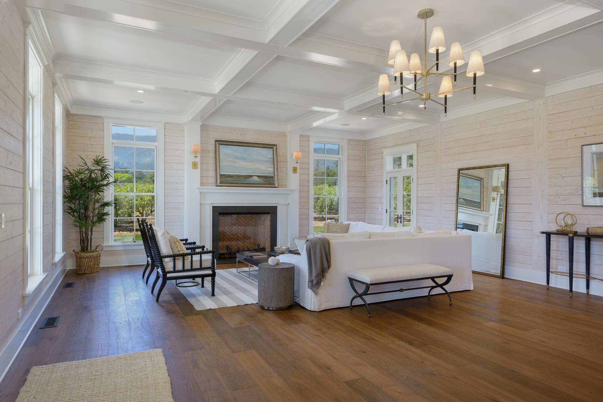 130 Tiburon Bay Lane Montecito, CA 93108 - Photo 5 of 31 a living room with furniture and a chandelier