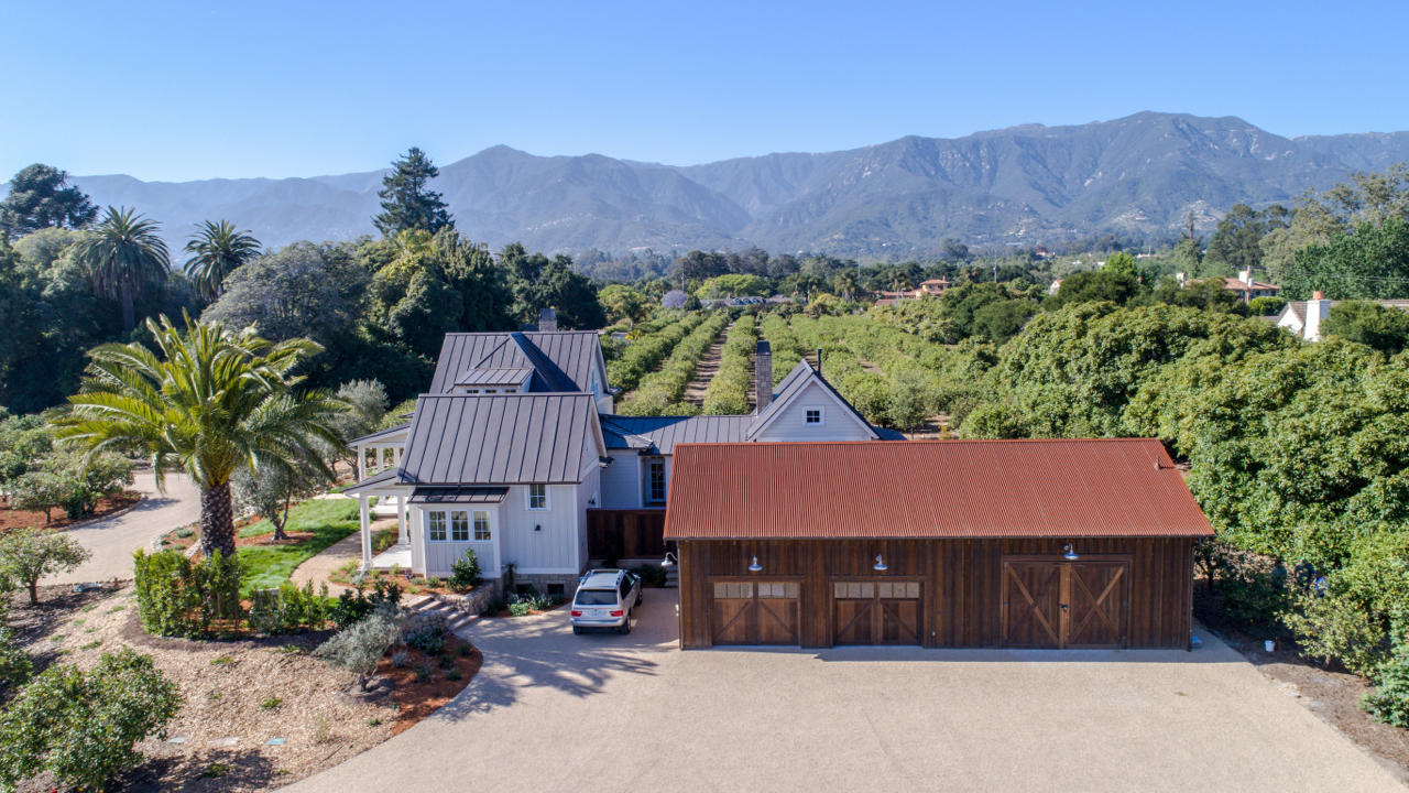 130 Tiburon Bay Lane Montecito, CA 93108 - Photo 8 of 31 a front view of a house with a yard and mountain