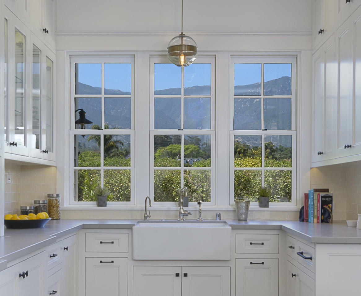130 Tiburon Bay Lane Montecito, CA 93108 - Photo 9 of 31 a kitchen with a window and a white counter