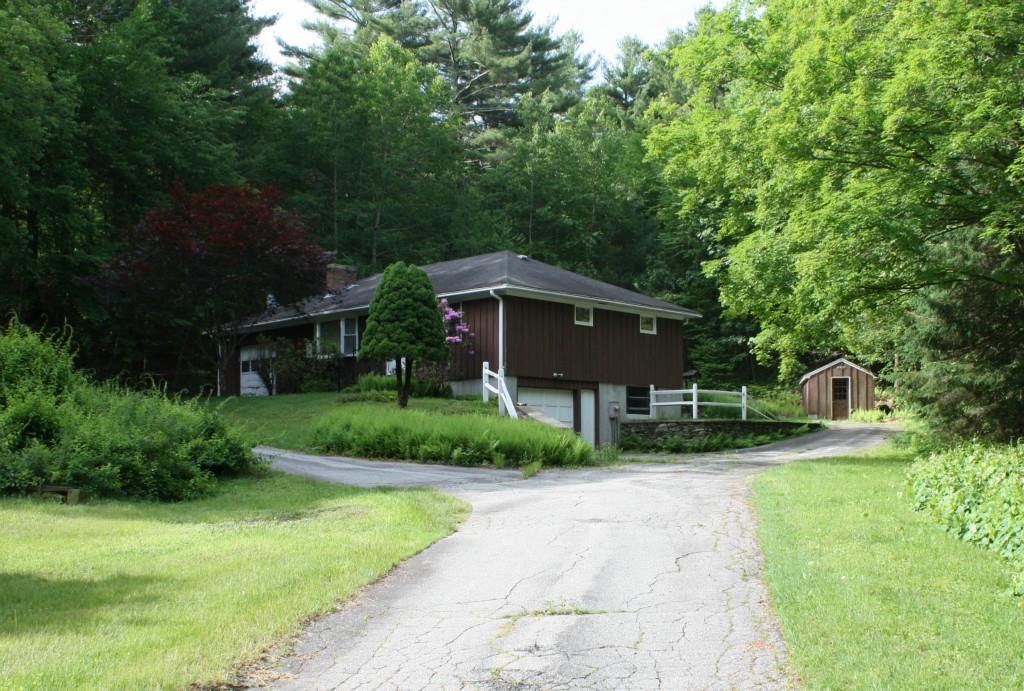 219 Valley Road Killingly, CT 06239 - Photo 1 of 1 a house view with a garden space